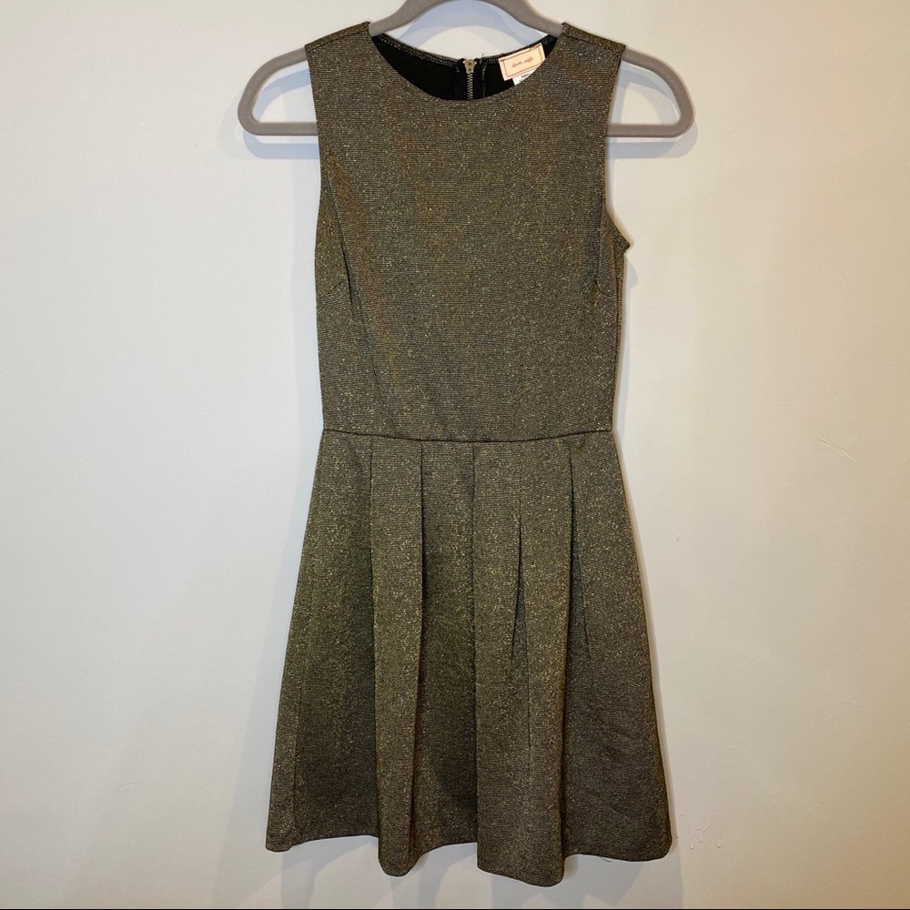 Love...Ady black and gold mini dress